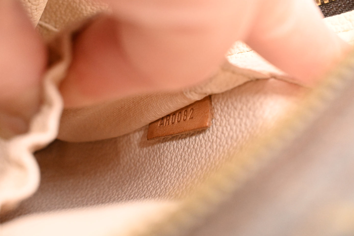 Louis Vuitton Spontini in Monogram Canvas