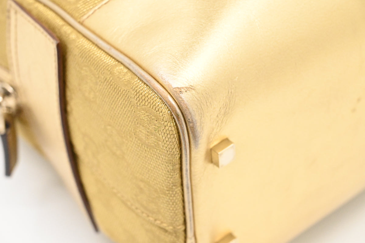 Gucci Boston Bag in Gold Canvas