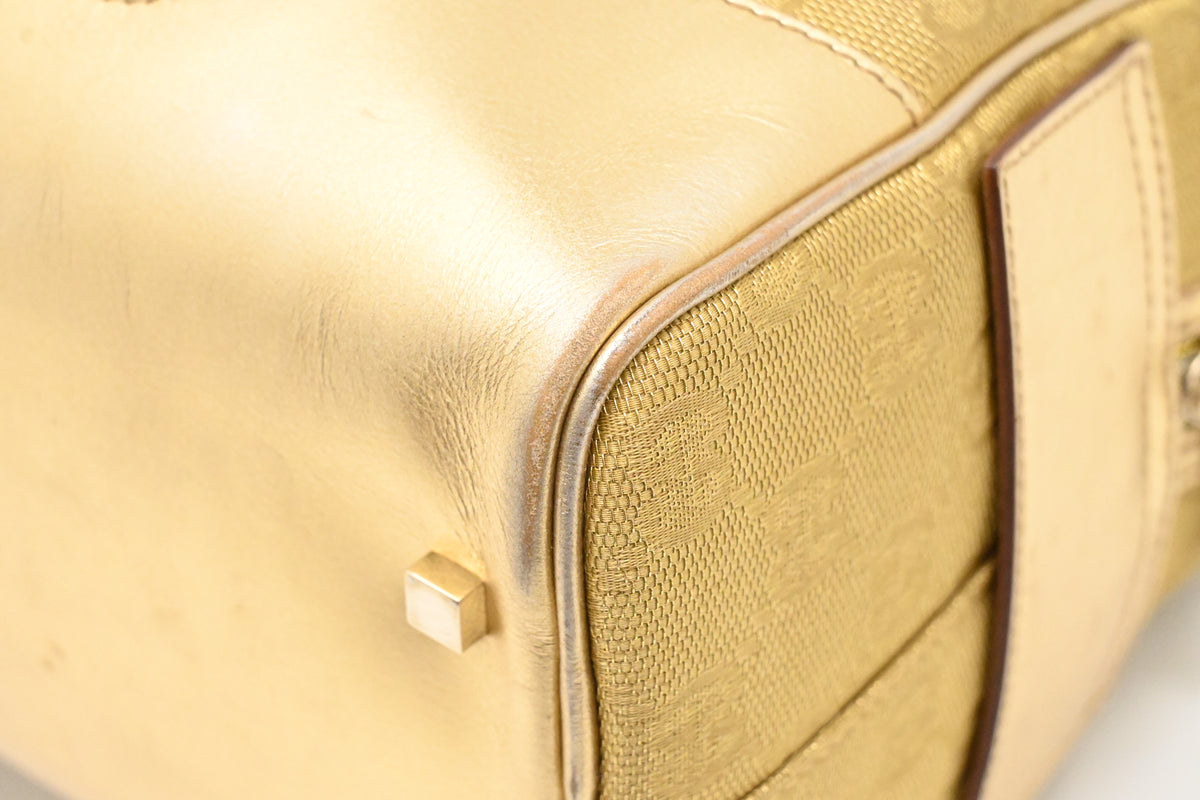 Gucci Boston Bag in Gold Canvas