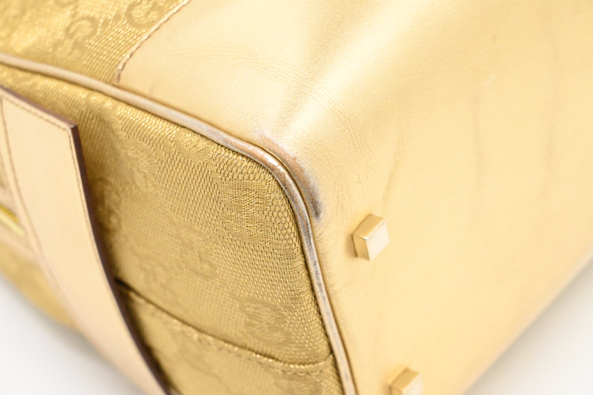 Gucci Boston Bag in Gold Canvas