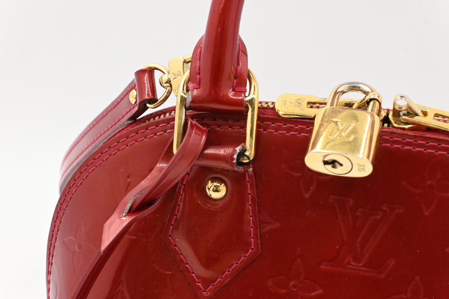 Louis Vuitton Alma BB in Red Vernis Leather