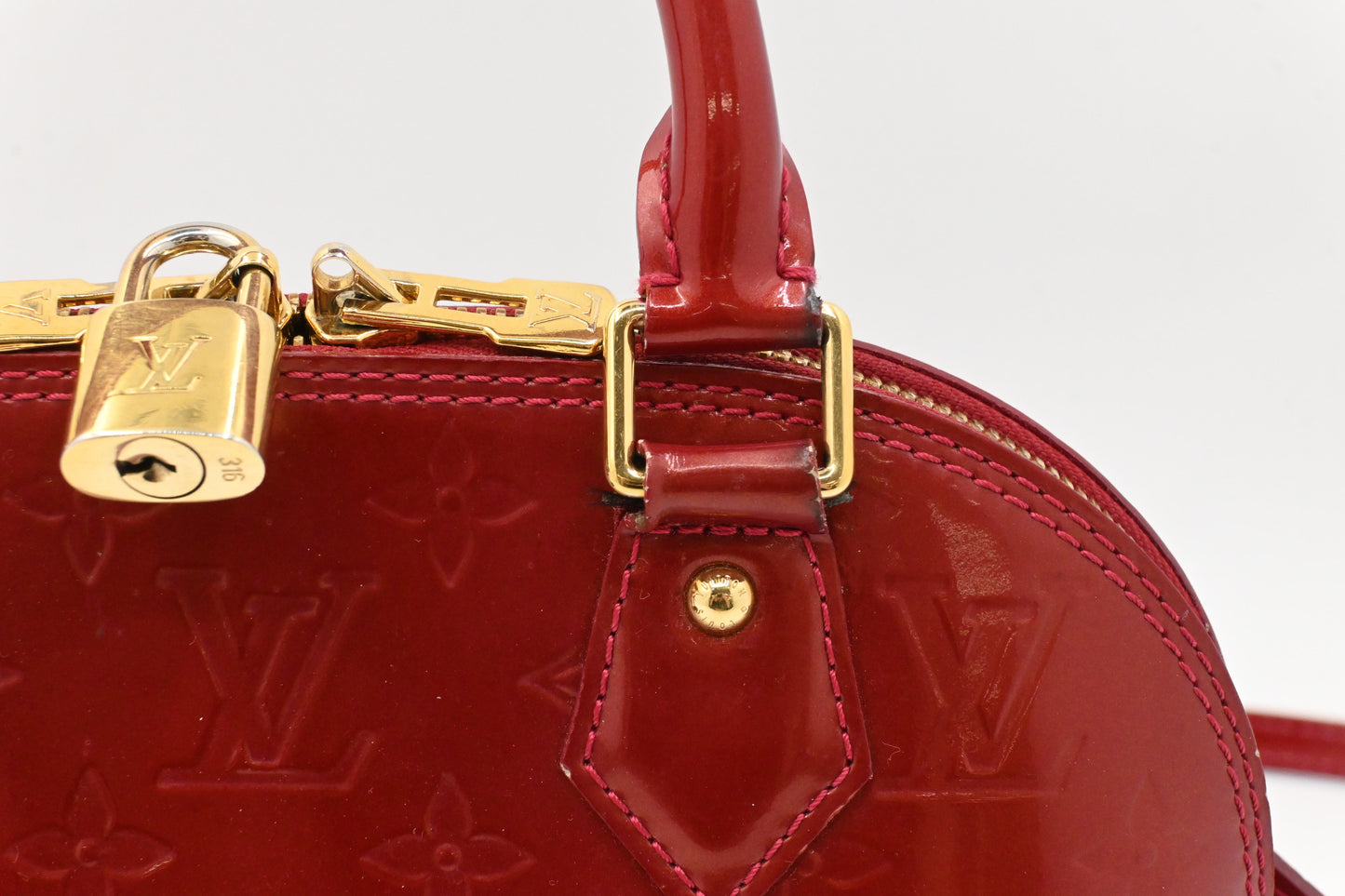 Louis Vuitton Alma BB in Red Vernis Leather