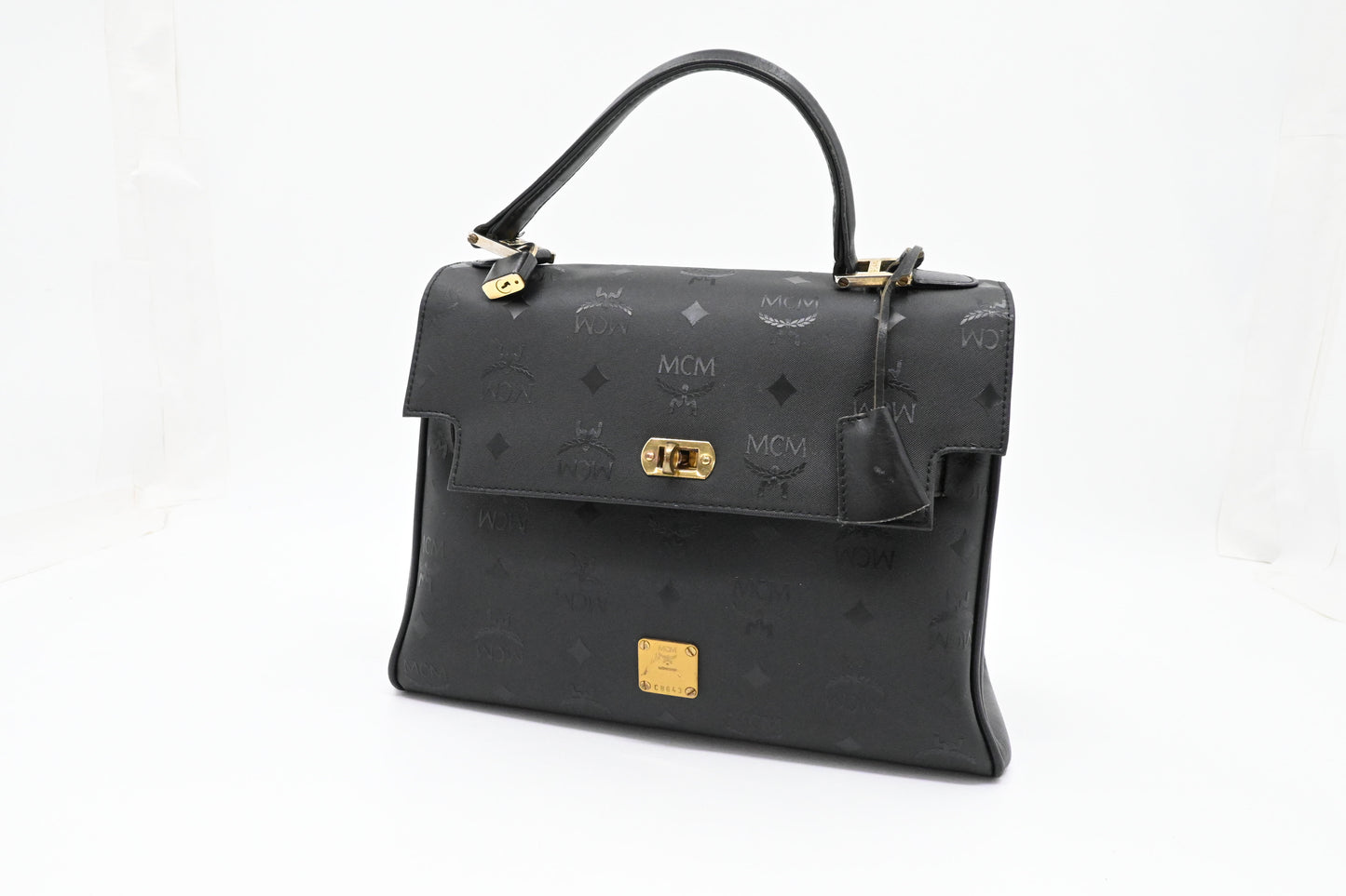 MCM Medium Kelly in Black Coated Canvas