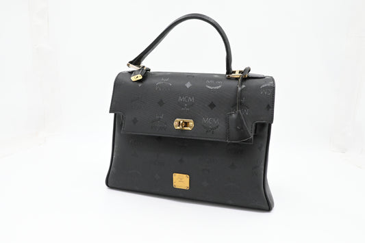 MCM Medium Kelly in Black Coated Canvas