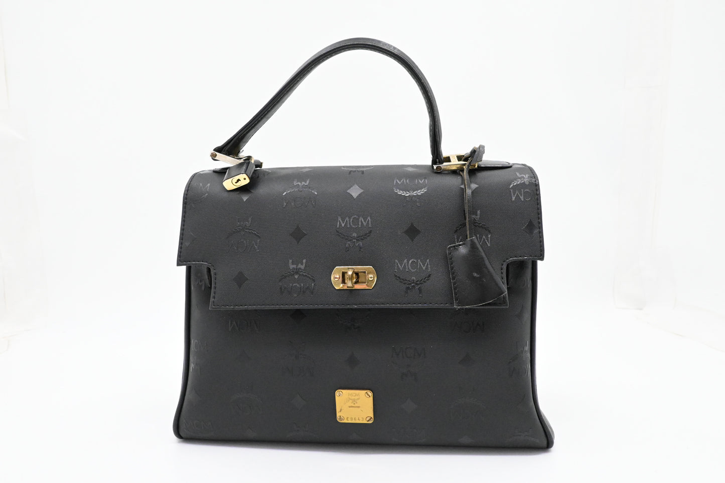 MCM Medium Kelly in Black Coated Canvas