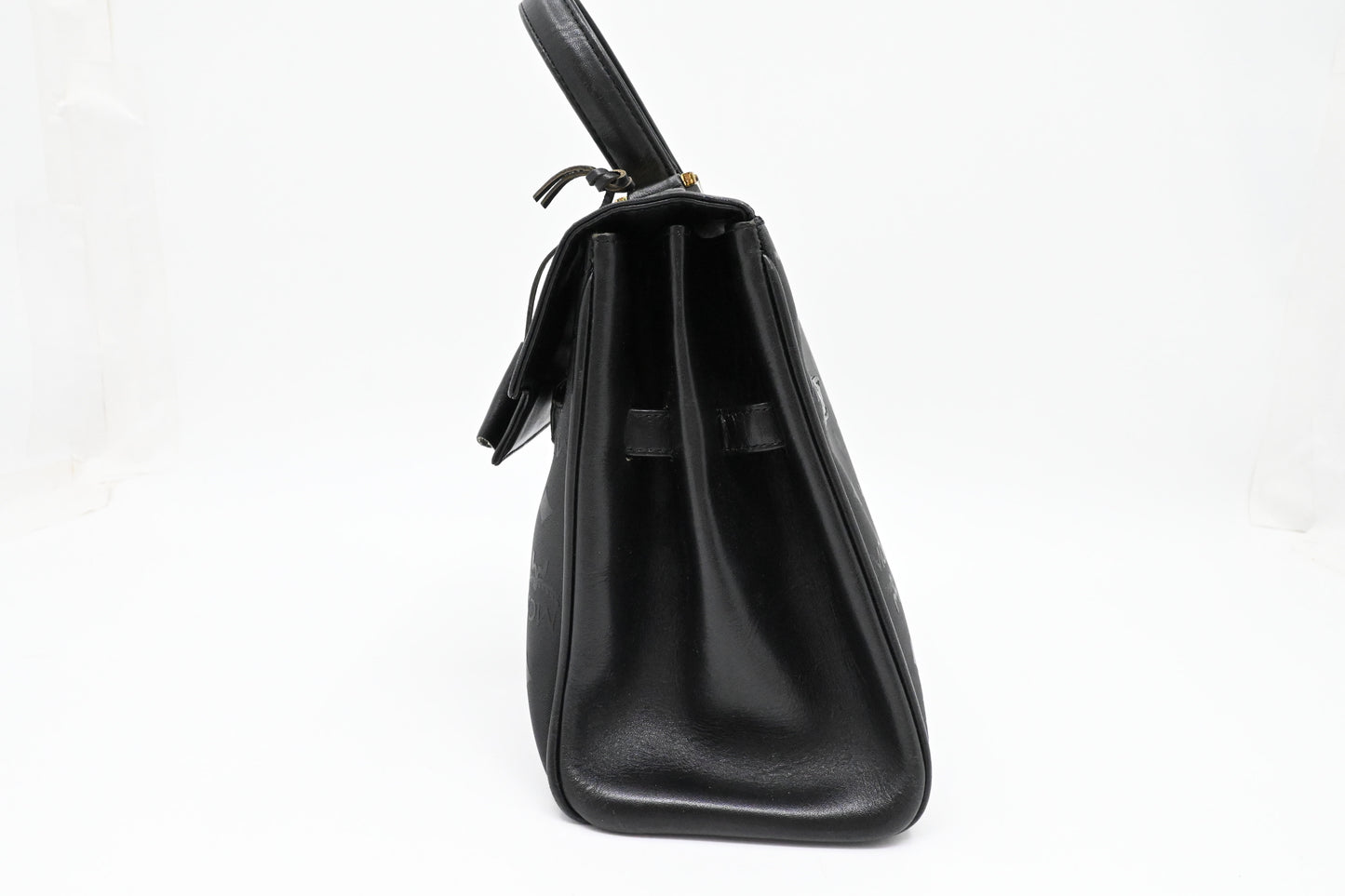 MCM Medium Kelly in Black Coated Canvas