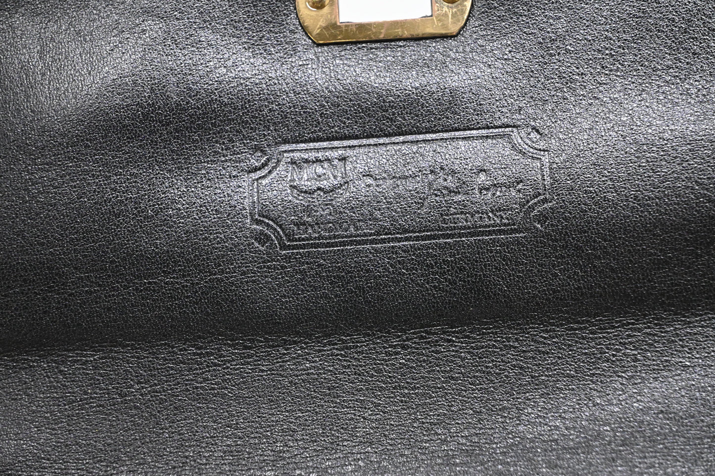 MCM Medium Kelly in Black Coated Canvas