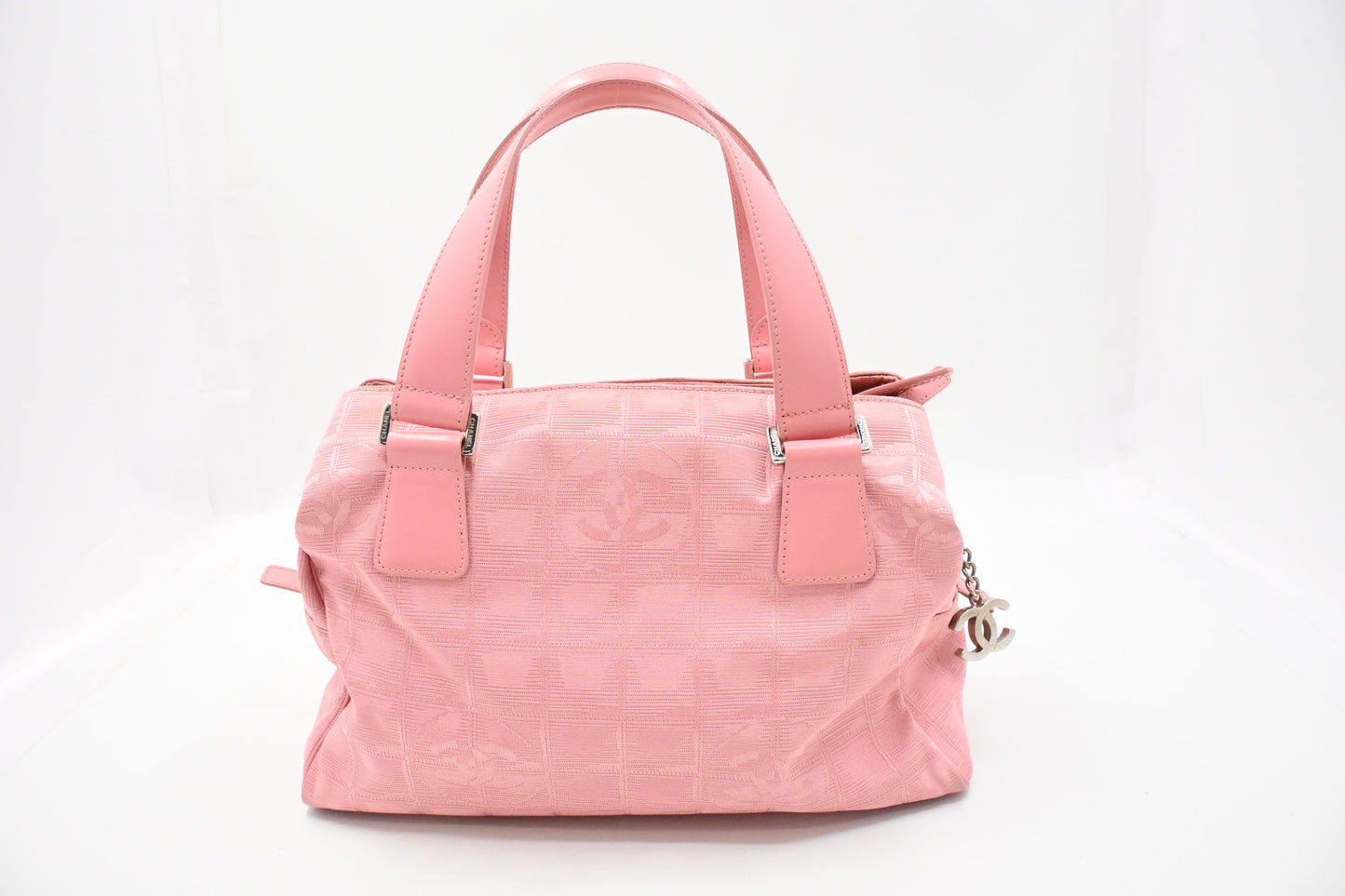 Chanel New Travel Line Handbag in Pink Canvas