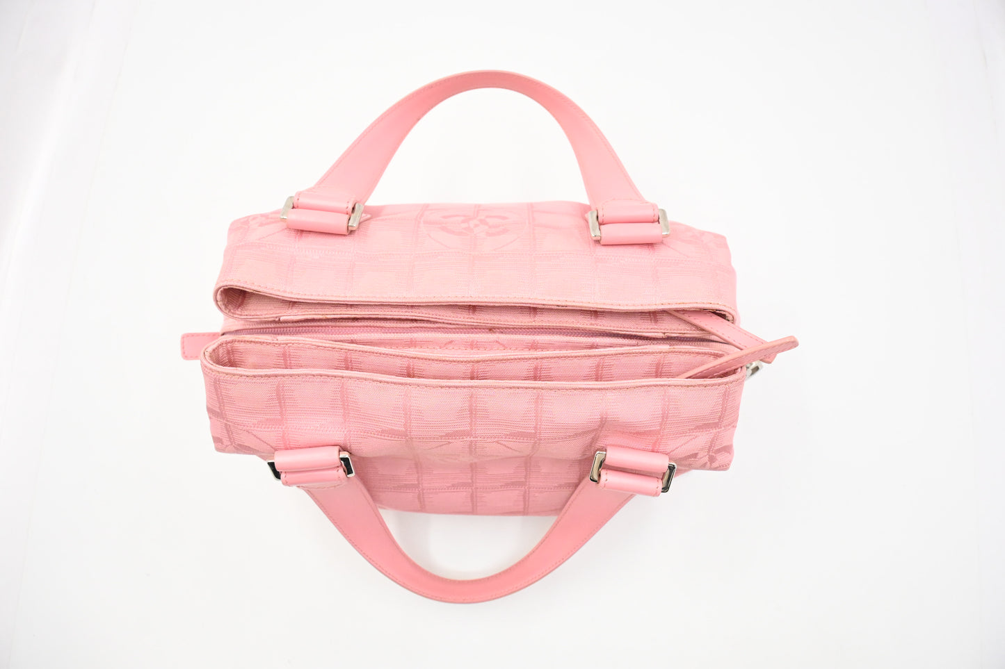 Chanel New Travel Line Handbag in Pink Canvas