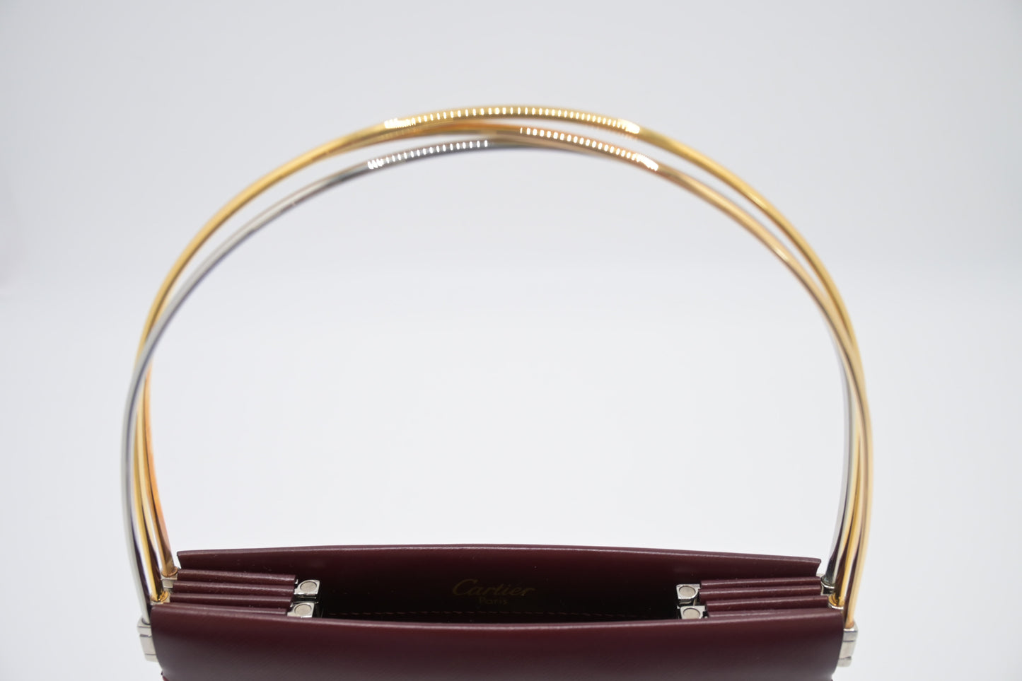 Cartier Folding Handbag in Burgundy Leather