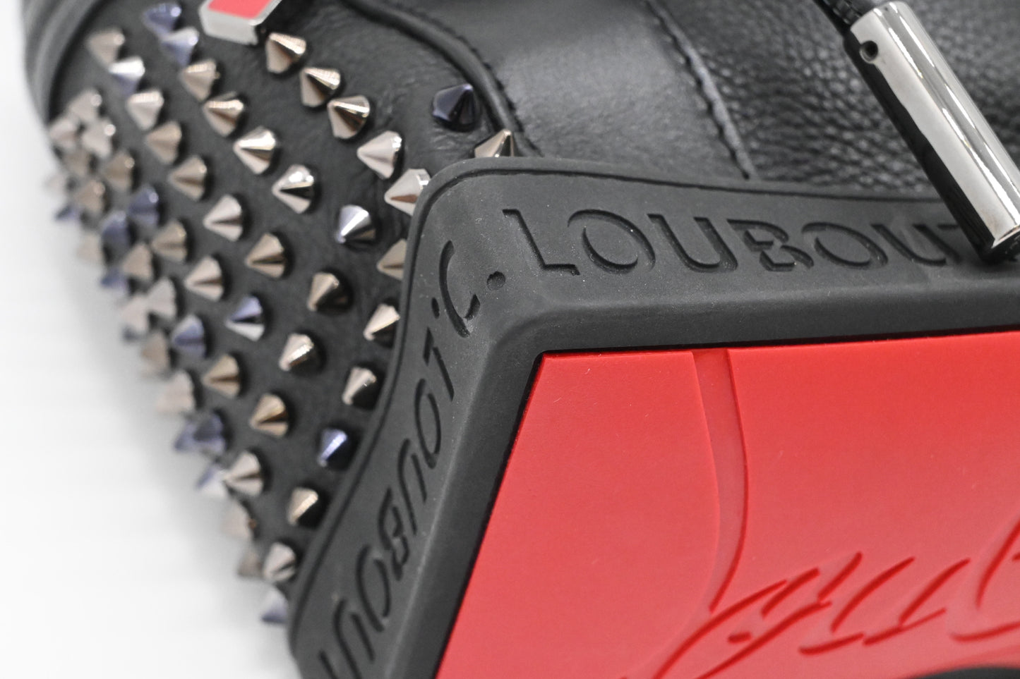 Louboutin Backpack in Black Studded Leather