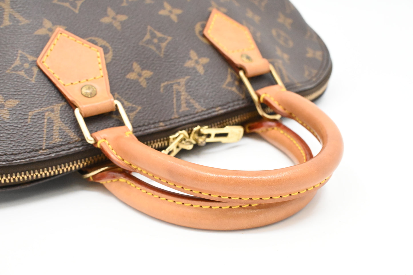 Louis Vuitton Alma PM in Monogram Canvas