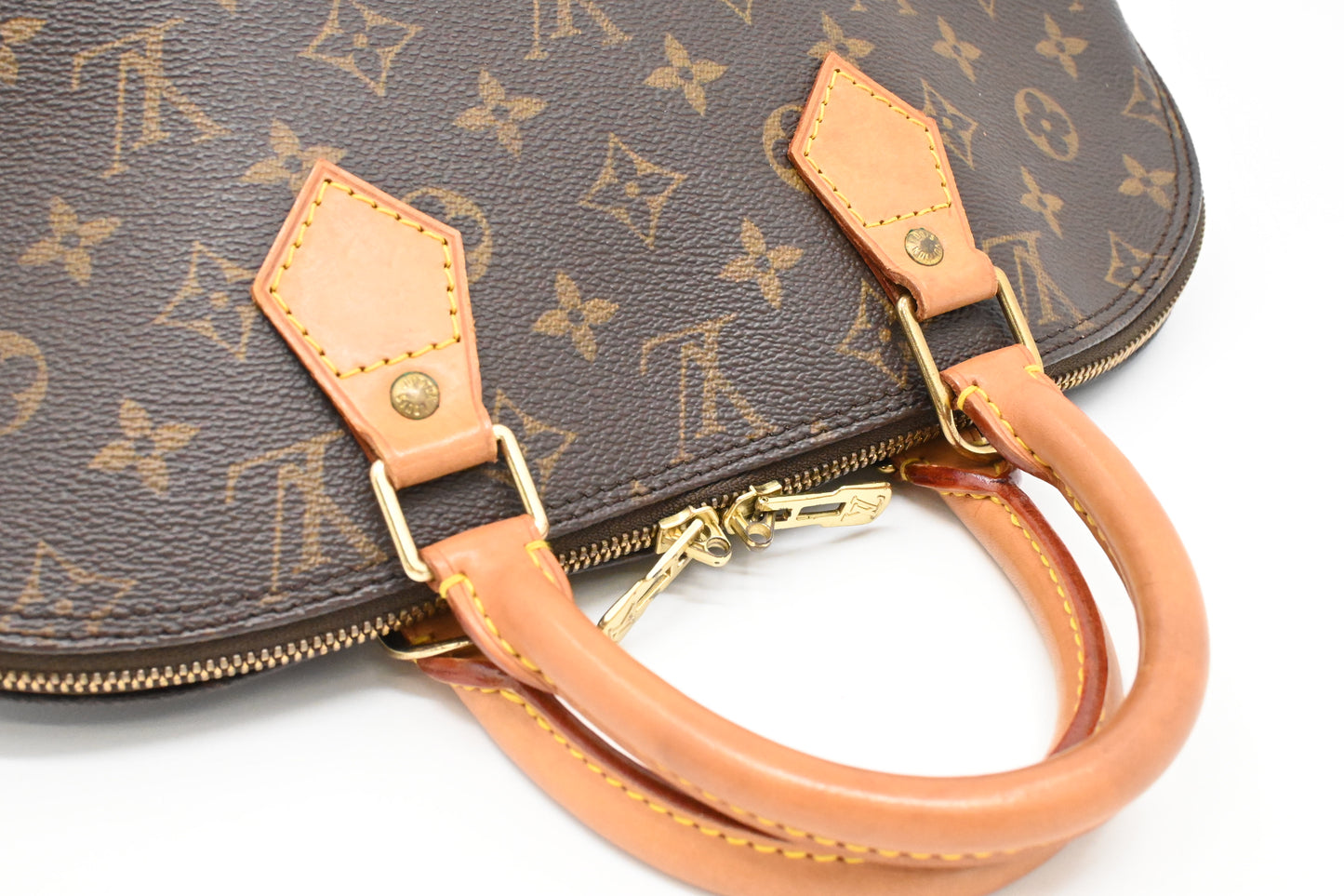 Louis Vuitton Alma PM in Monogram Canvas