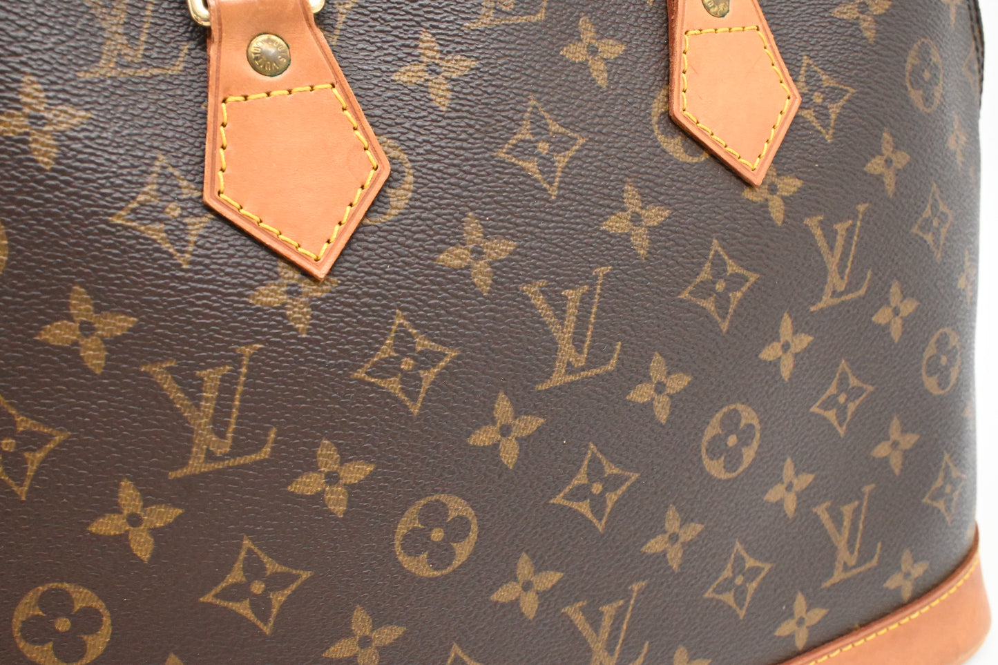 Louis Vuitton Alma PM in Monogram Canvas