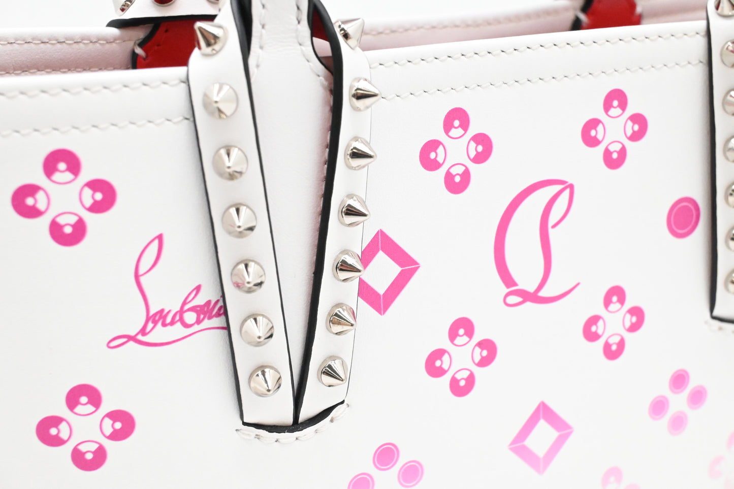 Louboutin Cabata in White and Pink Leather