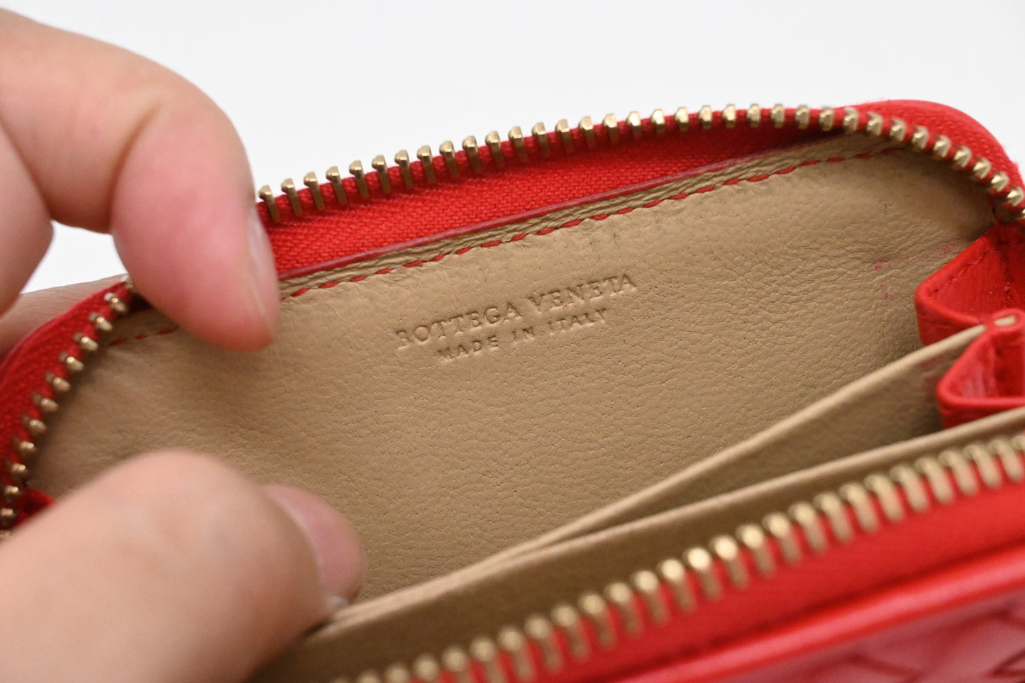 Bottega Veneta Compact Zippy in Red Intrecciato Leather