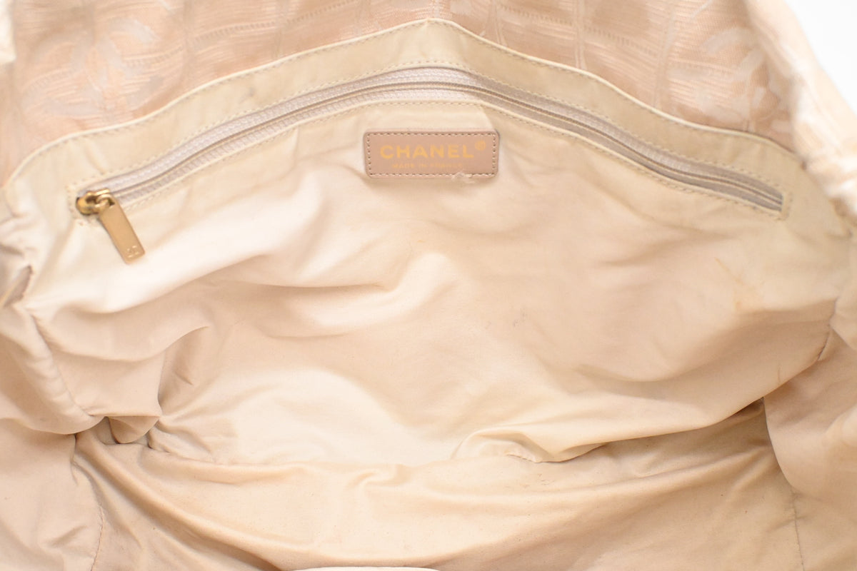Chanel New Travel Line Tote in Beige Canvas