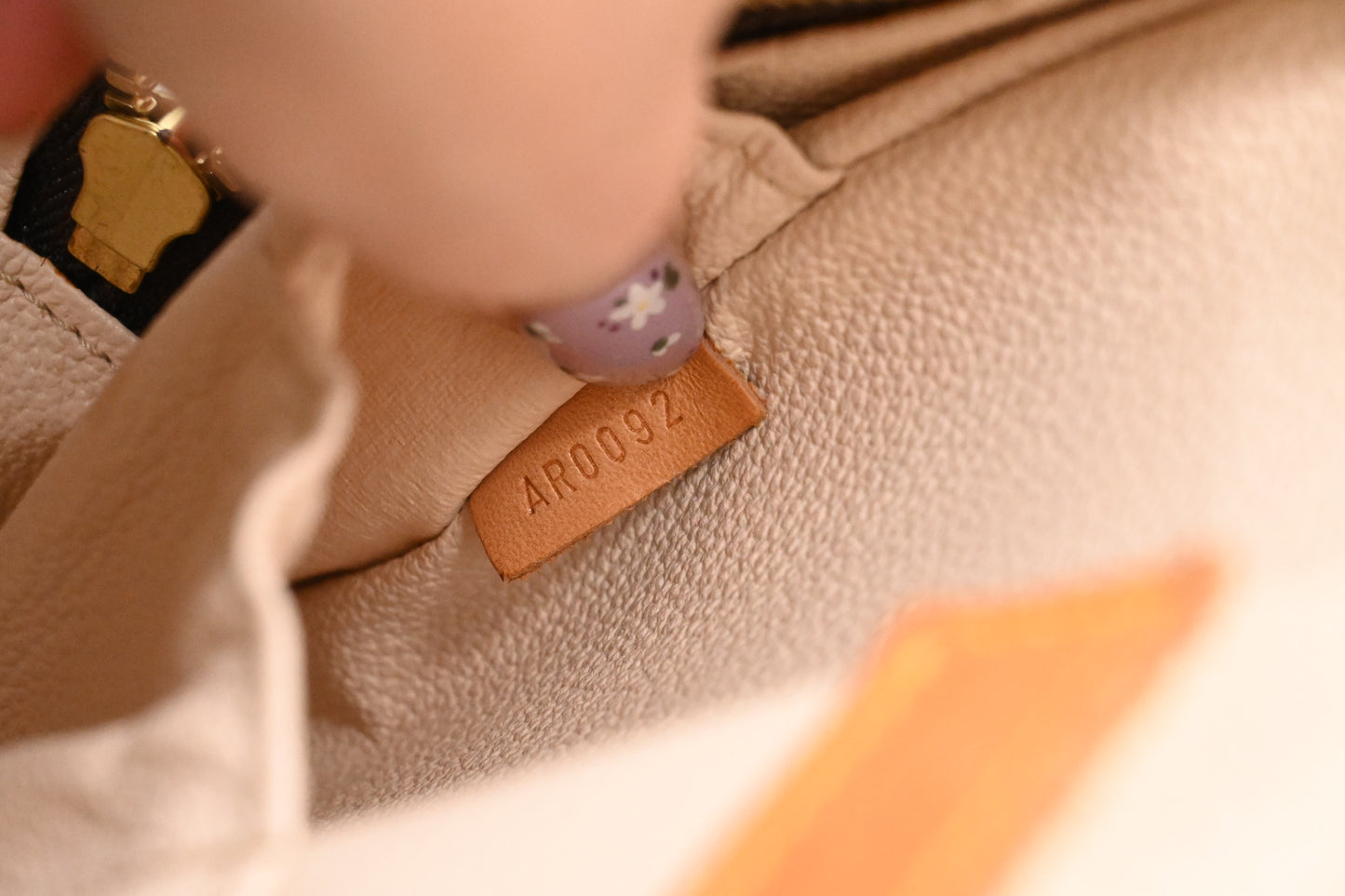 Louis Vuitton Spontini in Monogram Canvas