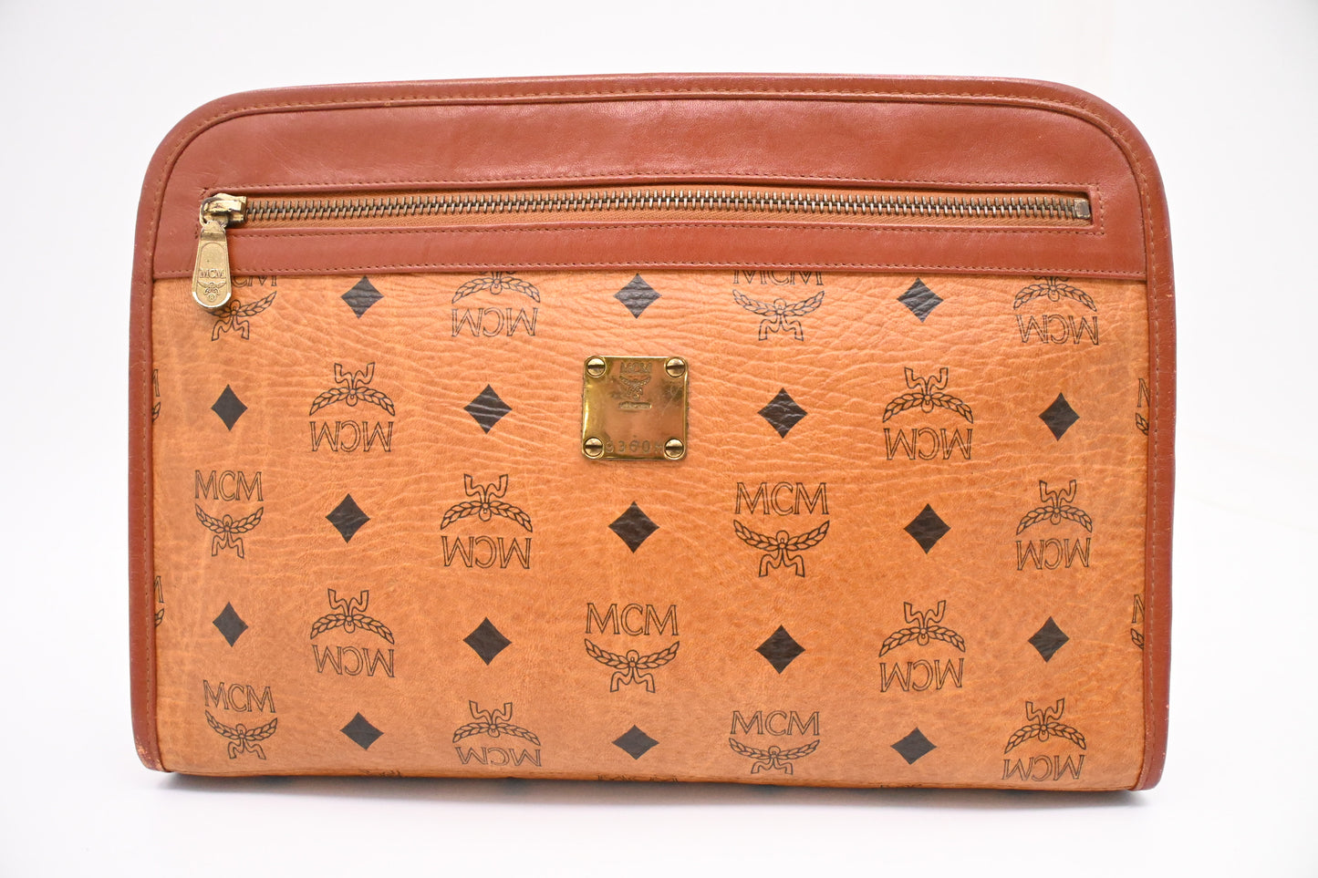 MCM Clutch Bag in Cognac Visetos Canvas