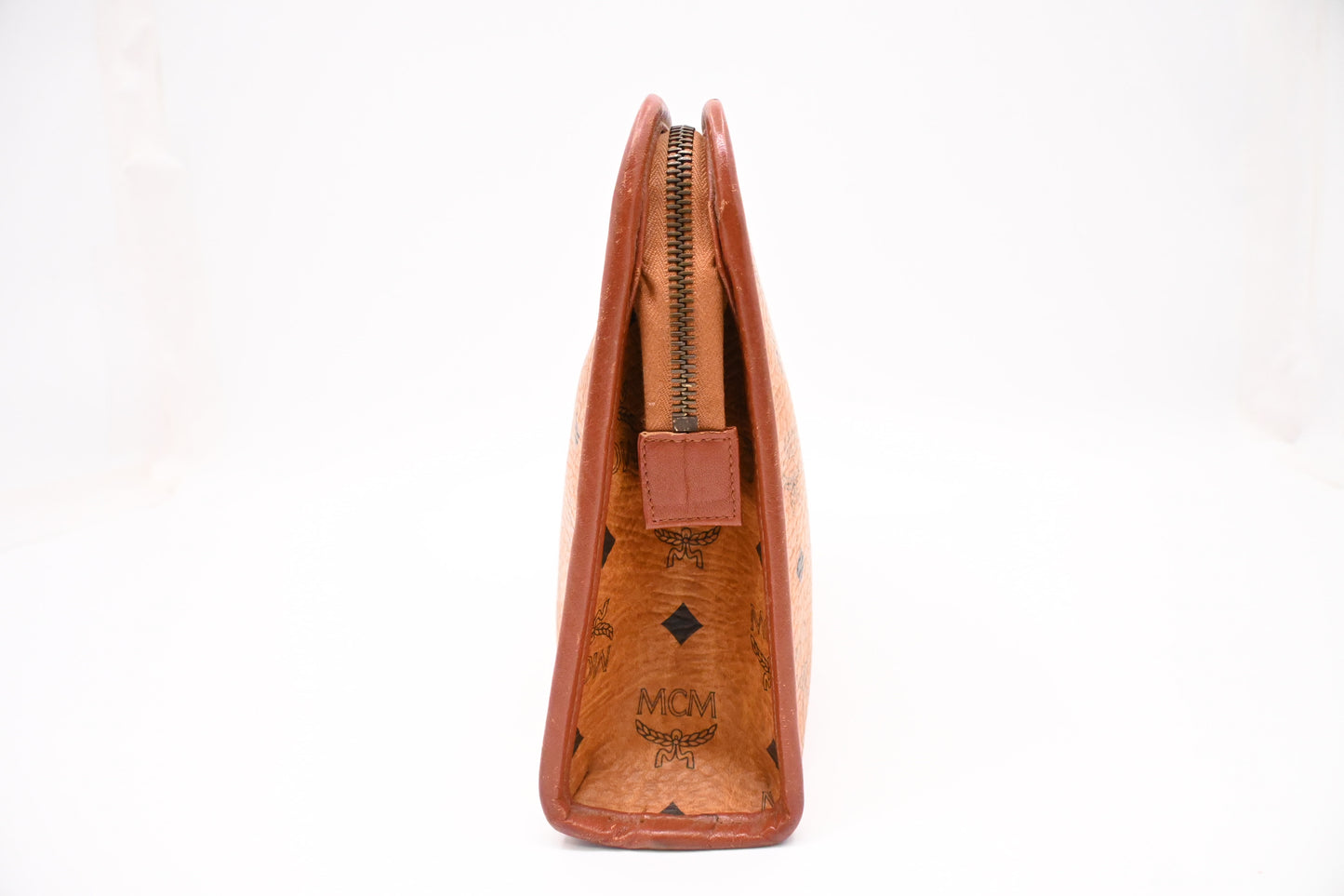 MCM Clutch Bag in Cognac Visetos Canvas