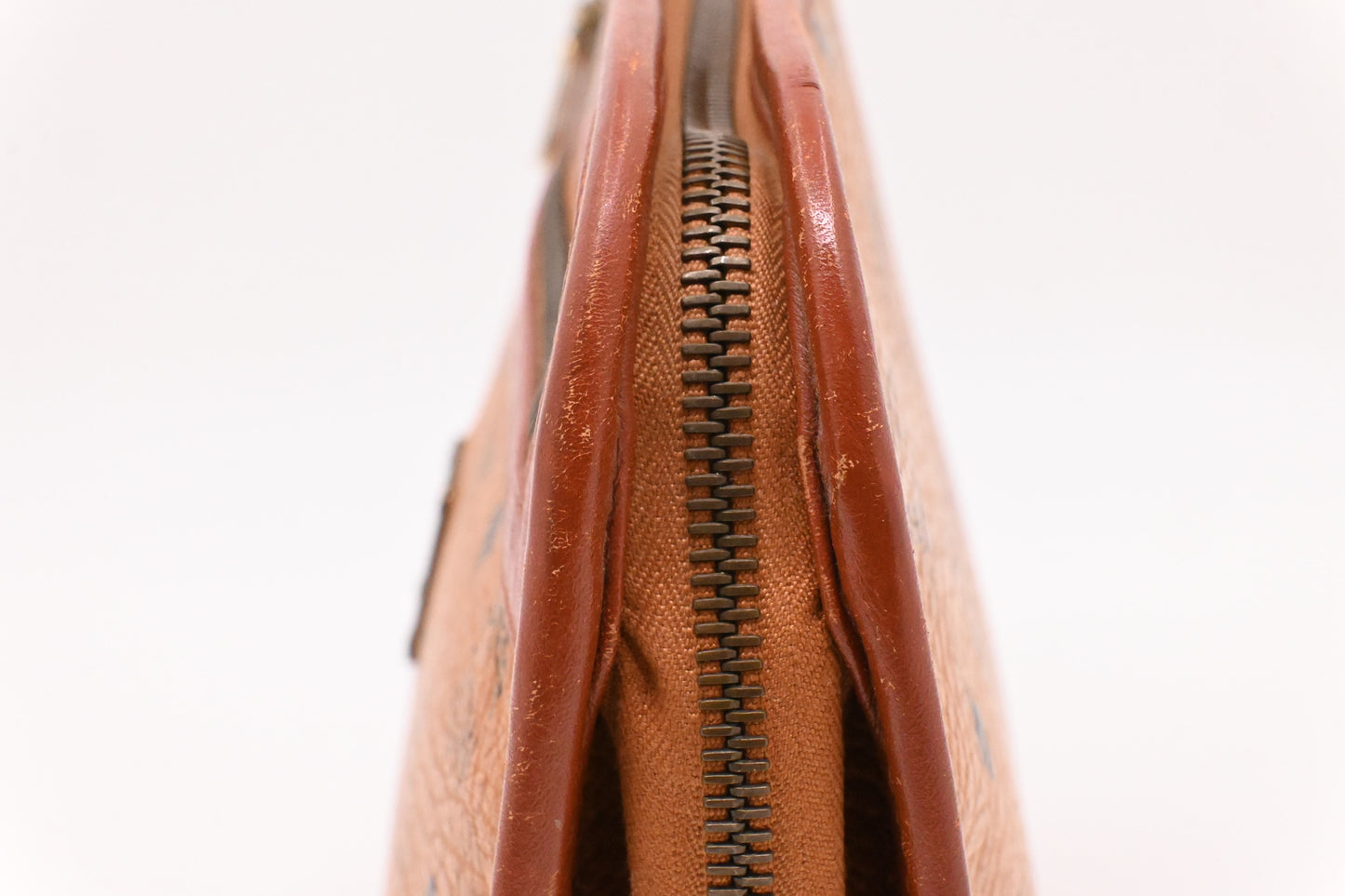 MCM Clutch Bag in Cognac Visetos Canvas