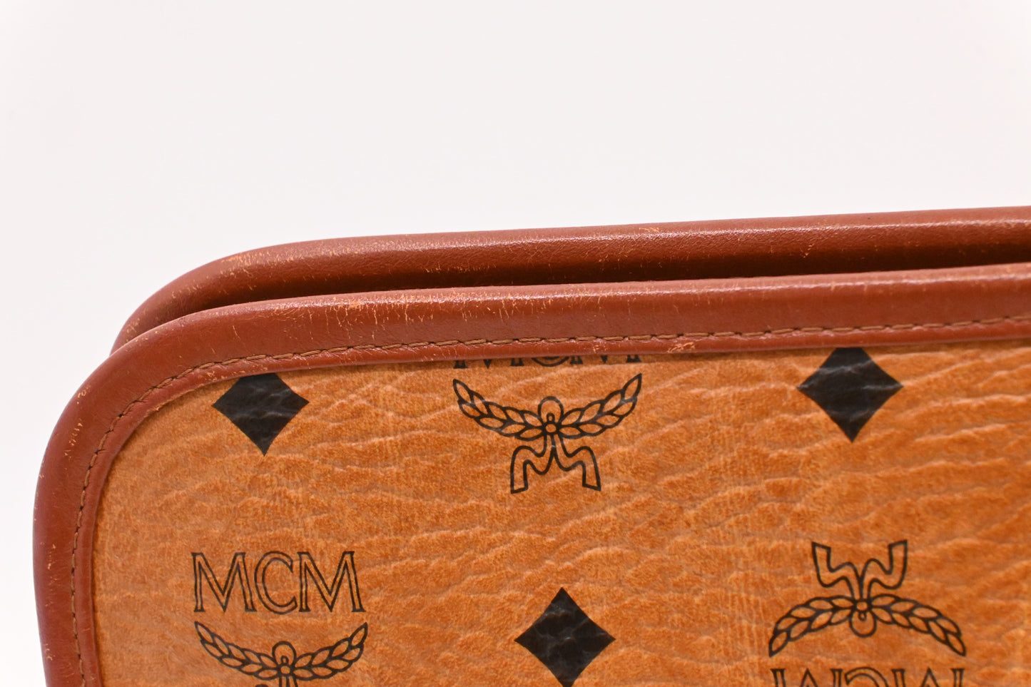 MCM Clutch Bag in Cognac Visetos Canvas