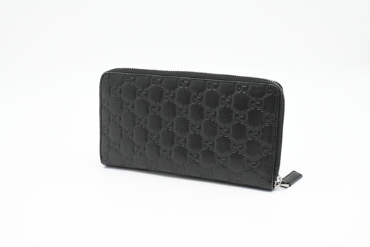 Gucci Zippy Organizer in Black Guccissima Leather