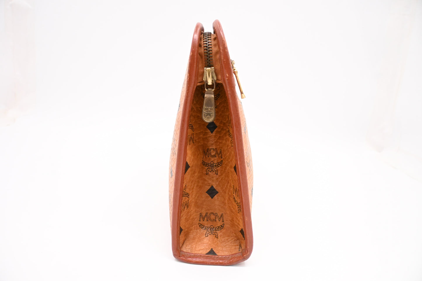 MCM Clutch Bag in Cognac Visetos Canvas
