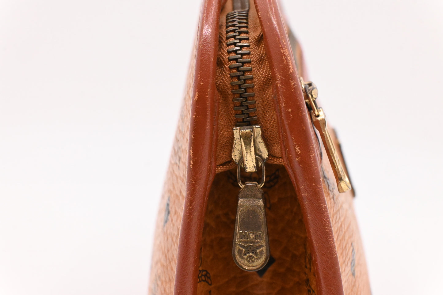 MCM Clutch Bag in Cognac Visetos Canvas