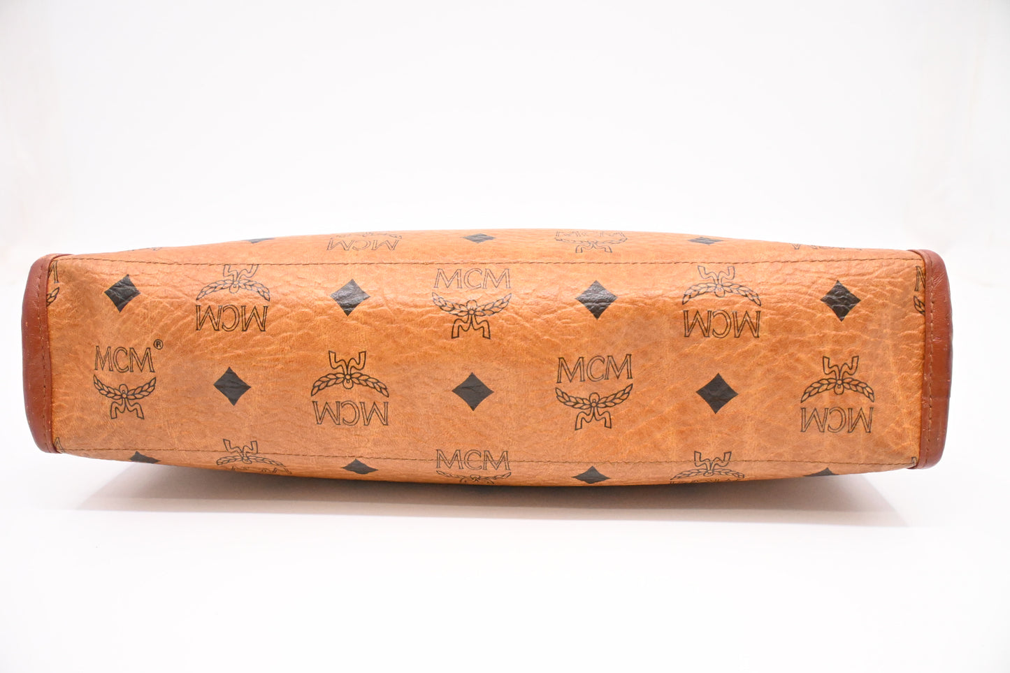 MCM Clutch Bag in Cognac Visetos Canvas