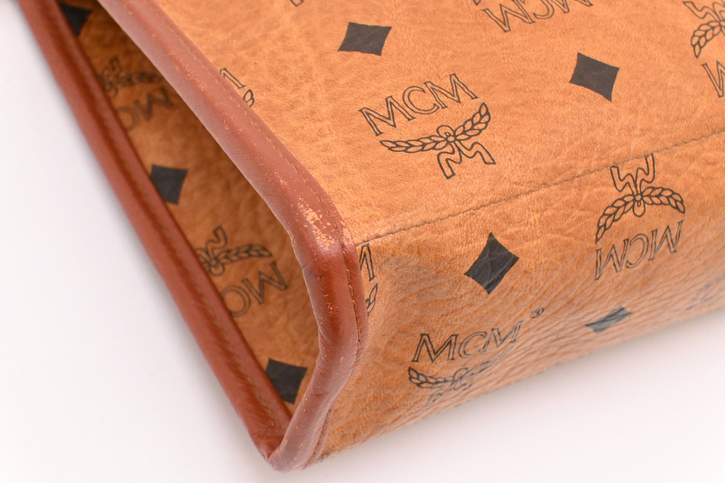 MCM Clutch Bag in Cognac Visetos Canvas