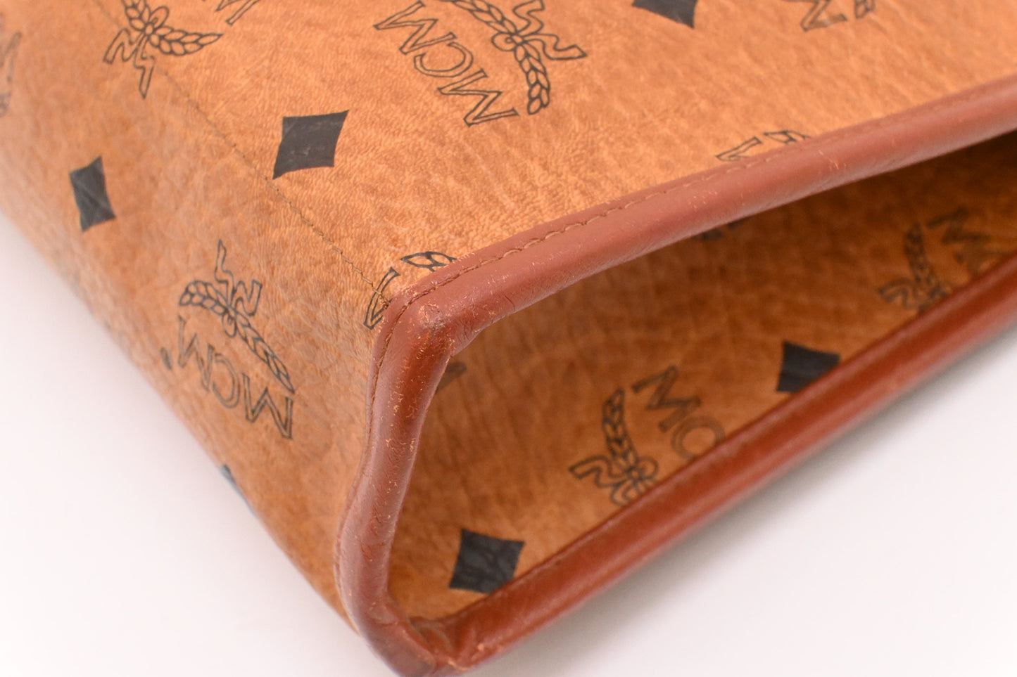 MCM Clutch Bag in Cognac Visetos Canvas
