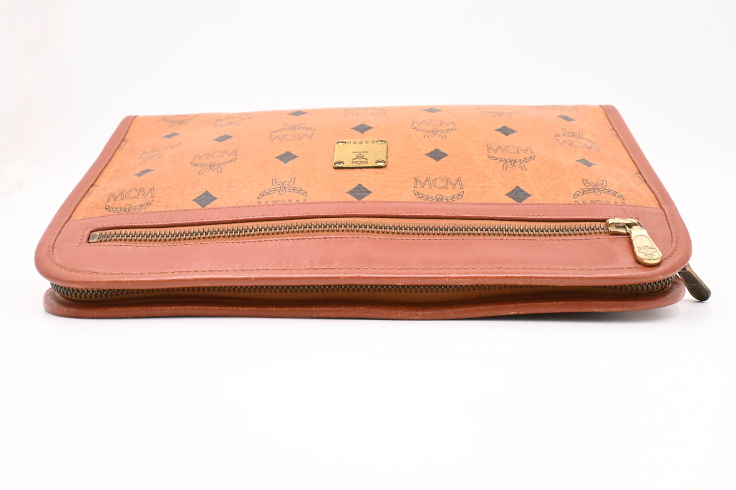 MCM Clutch Bag in Cognac Visetos Canvas