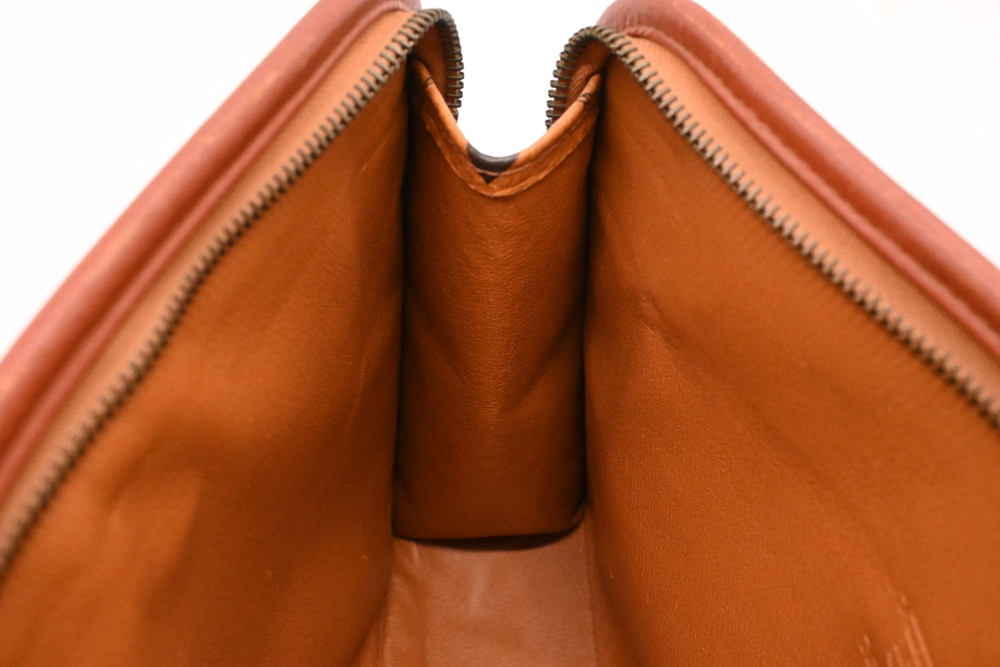 MCM Clutch Bag in Cognac Visetos Canvas