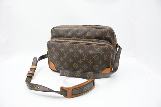 Louis Vuitton Nile PM in Monogram Canvas