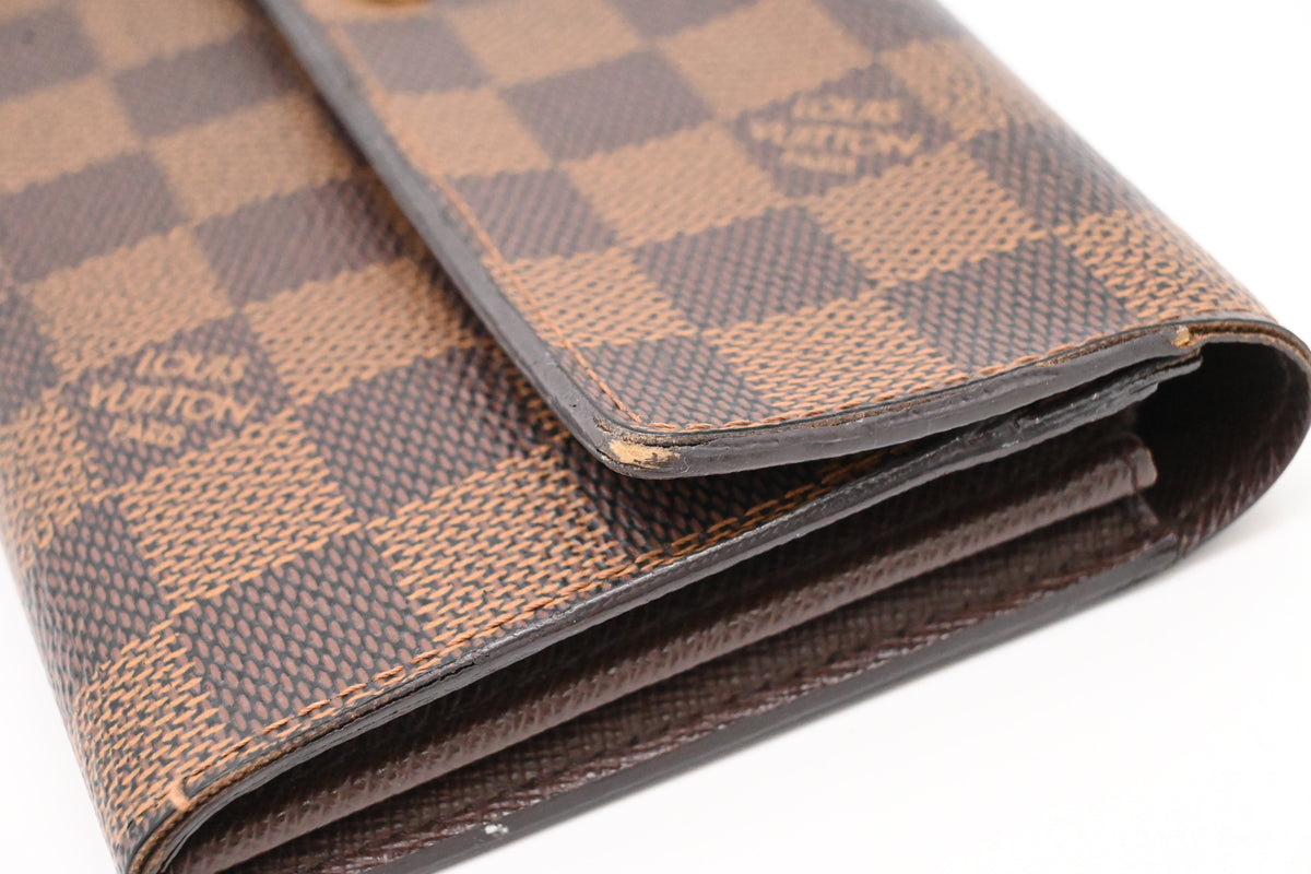 Louis Vuitton Sarah Wallet in Damier Ebene Canvas