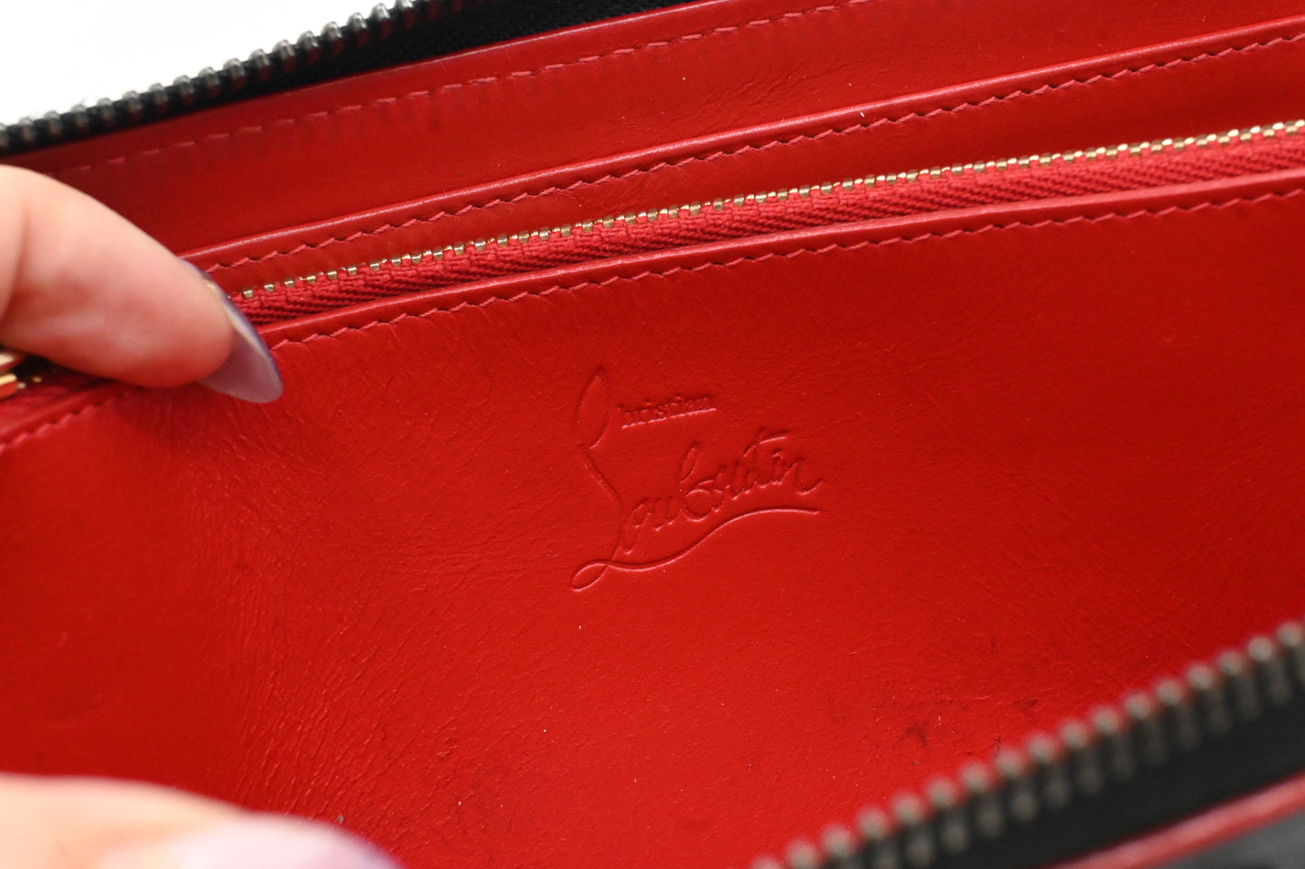 Louboutin Zippy Wallet in Black Spiked Leather