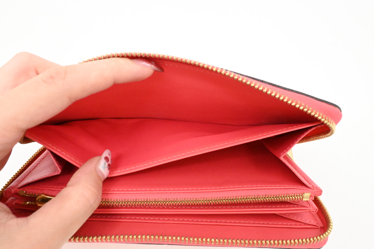 Louis Vuitton Zippy Wallet in Grapefruit Pink Vernis Leather
