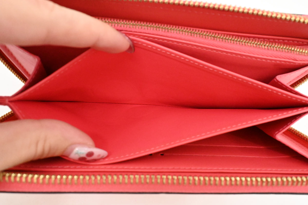 Louis Vuitton Zippy Wallet in Grapefruit Pink Vernis Leather