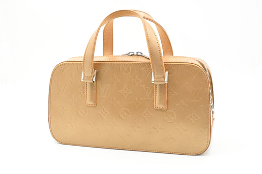 Louis Vuitton Shelton in Gold Matte Monogram Leather