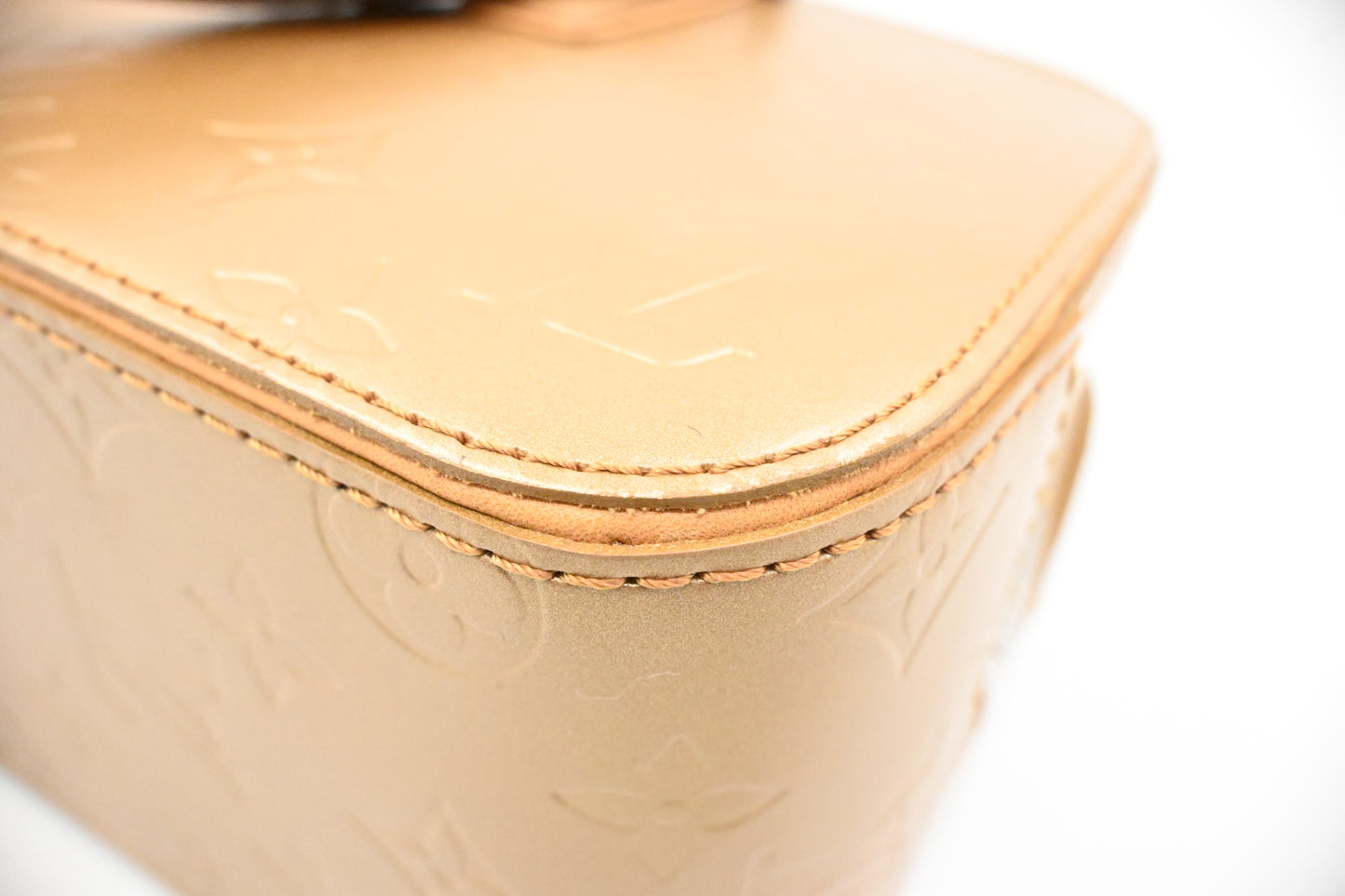 Louis Vuitton Shelton in Gold Matte Monogram Leather
