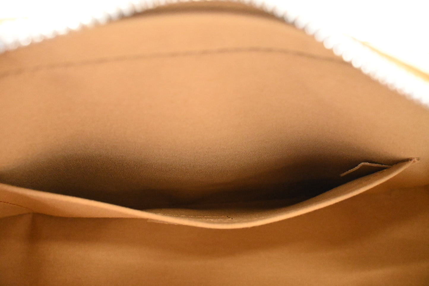 Louis Vuitton Shelton in Gold Matte Monogram Leather