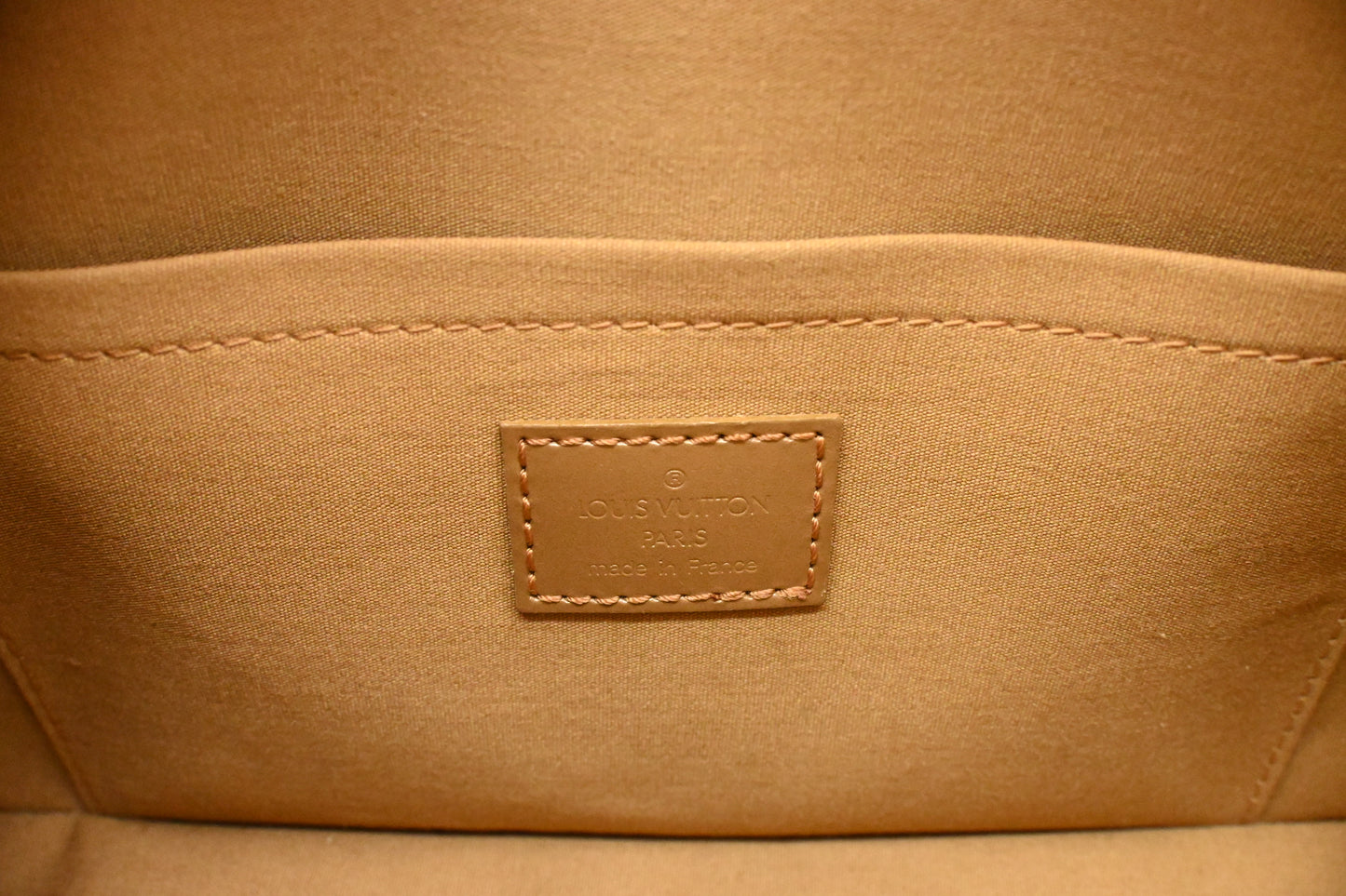 Louis Vuitton Shelton in Gold Matte Monogram Leather