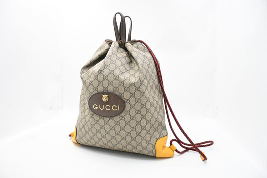 Gucci Tiger Drawstring Backpack in GG Supreme Canvas