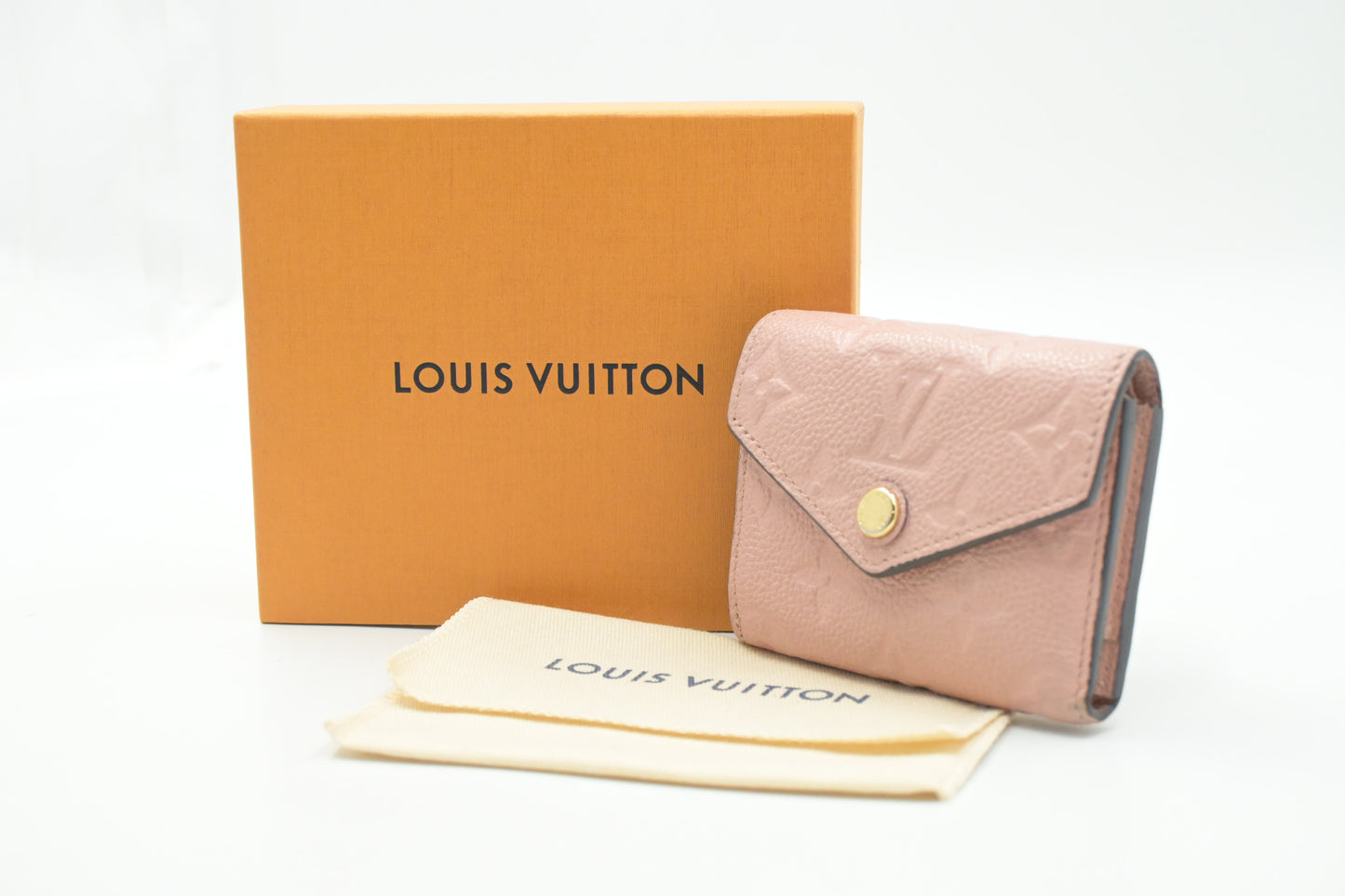 Louis Vuitton Zoe Wallet in Rose Poudre Empreinte Leather