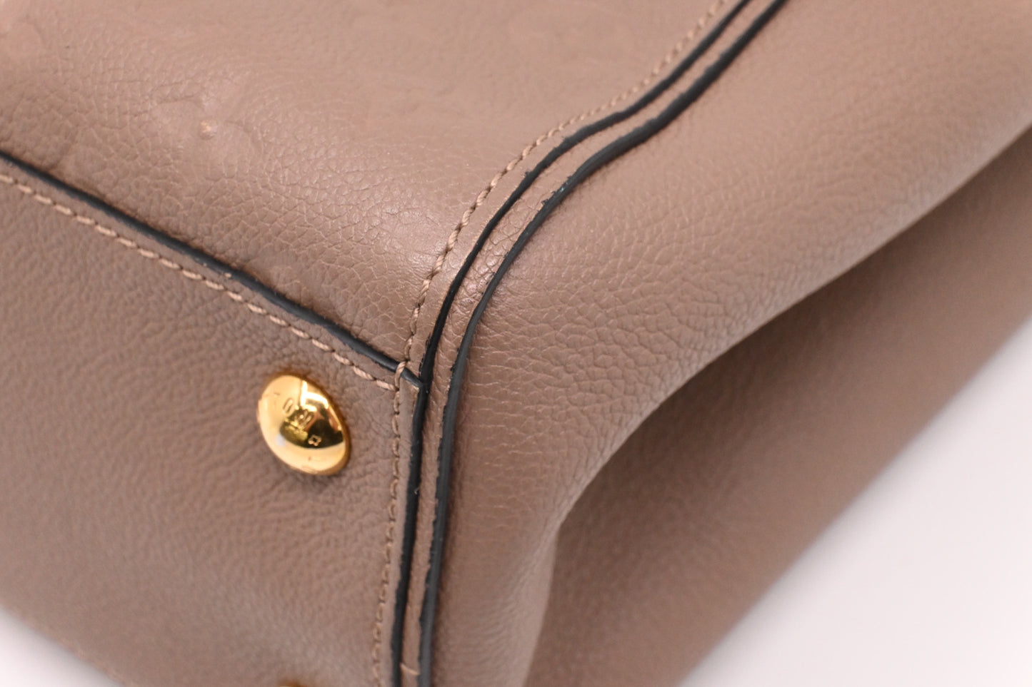 Louis Vuitton Trocadero in Taupe Empreinte Leather