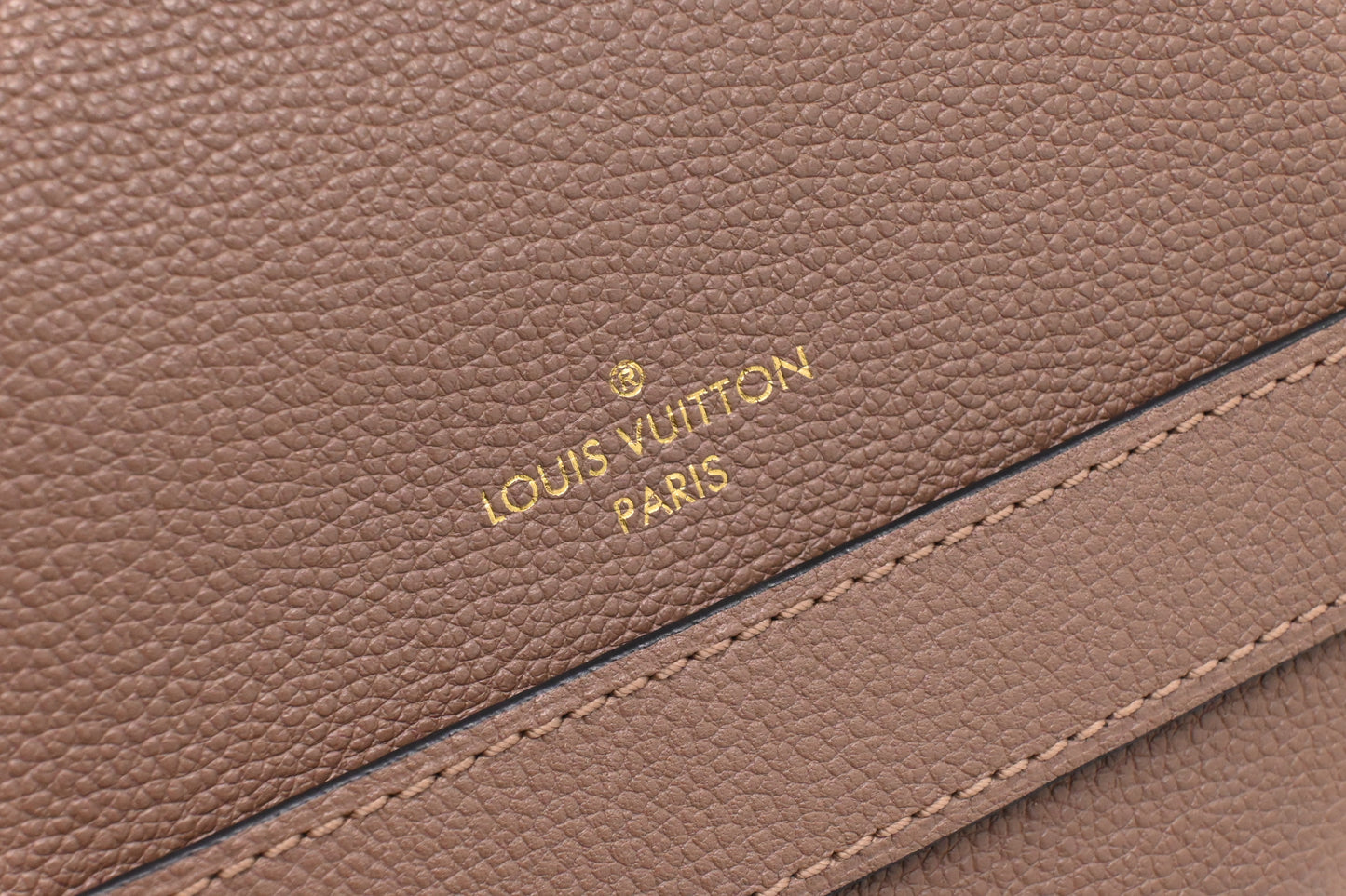 Louis Vuitton Trocadero in Taupe Empreinte Leather