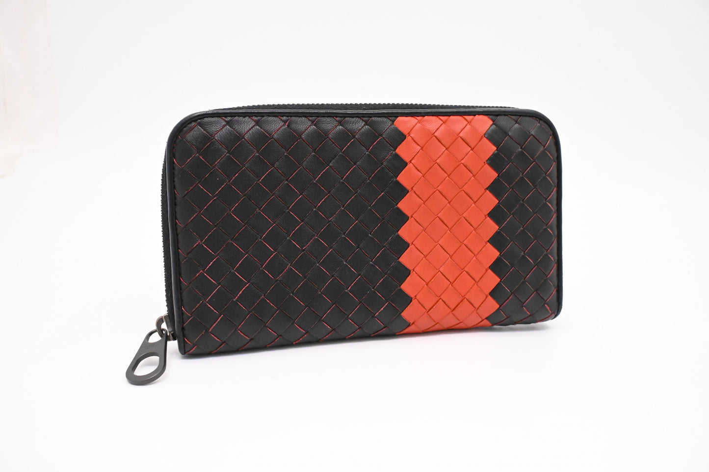 Bottega Veneta Zippy Wallet in Black and Orange Intrecciato Leather