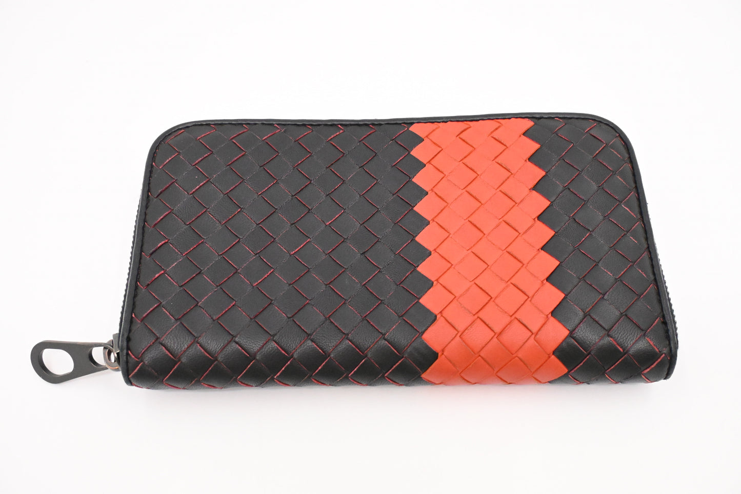 Bottega Veneta Zippy Wallet in Black and Orange Intrecciato Leather