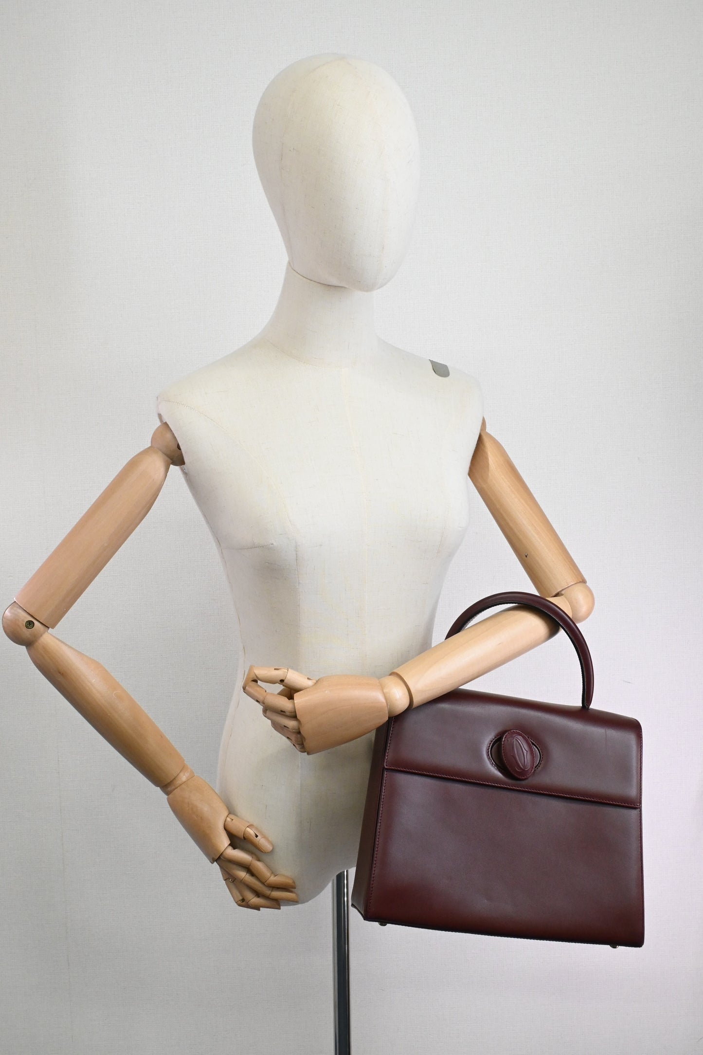 Cartier Top Handbag in Burgundy Leather